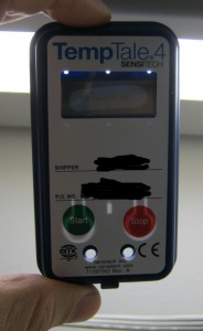 See-thru view of front case, showing button flexures and a small opening in the plastic to bring the temperature sensor closer to the outside environment.